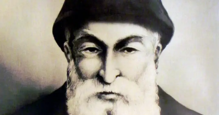 Portret ojca Szarbel, starszego mężczyzny z bujną białą brodą i w czarnym nakryciu głowy.